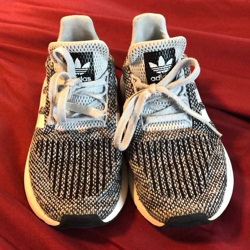 Boys canvas Adidas tennis shoes.